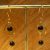 Boucles d’oreille en onyx avec cercle doré