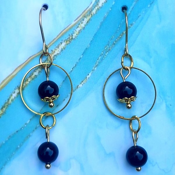 Boucles d’oreille en onyx avec cercle doré