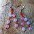 boucle d'oreille en quartz-rose sur fil nylon rouge