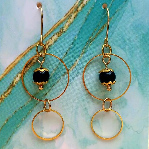 Boucles d’oreilles en onyx noir avec cercles dorés