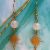 Boucles d’oreilles en quartz rose avec soleil doré – fait main
