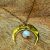Collier pierre de lune et croissant de lune doré